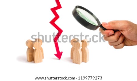 Magnifying glass is looking at the wooden red chart arrow down divides the two groups discussing the case. breaking ties. Contract break, conflict of interests. Negotiations of businessmen.