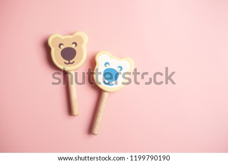 Children’s toy wood. Colorful of ice cream model on pink background. Symbol foods in summer