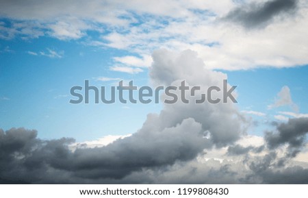 blue sky with various shapes of clouds and clouds