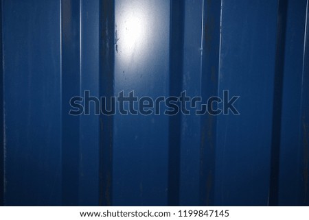 Blue metal wall. Blue textured background.