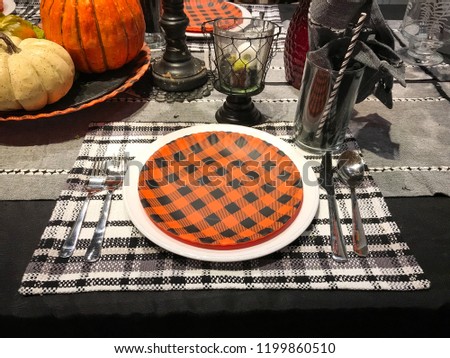 Halloween Fall Tablesetting. Autumn harvest dishes with placemats
