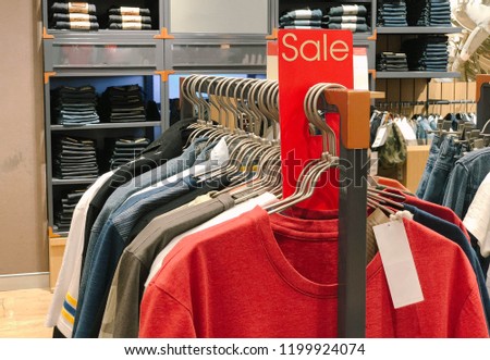 Promotion event sale in shopping mall or department store,Discounts on department store clothing with copy space.