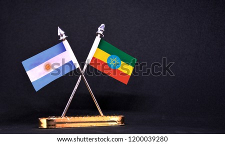 Argentina and Ethiopia table flag with black Background
