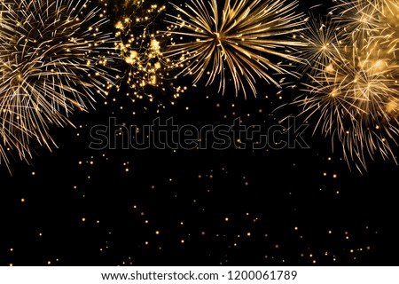 fireworks on black background, frame or border from golden sparks and firecrackers isolated Royalty-Free Stock Photo #1200061789