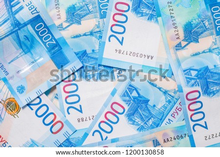 Background of two thousands of ruble notes. Wealth, finance 