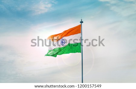 INDIA FLAG FLYING Royalty-Free Stock Photo #1200157549