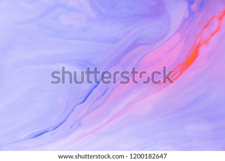 Abstract violet marble background. Stains of paint on the water.