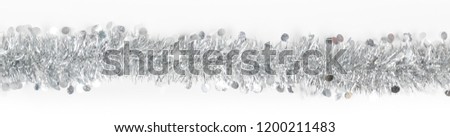 Christmas silver grey garland photo on white background. Banner, panoramic