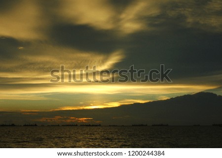 coastal sunset clouds,sunset sky clouds,golden sunset clouds with the sea