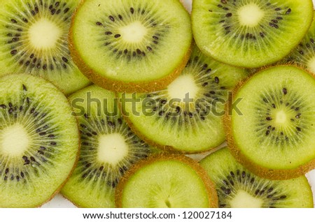 Kiwi fruit slices on white background