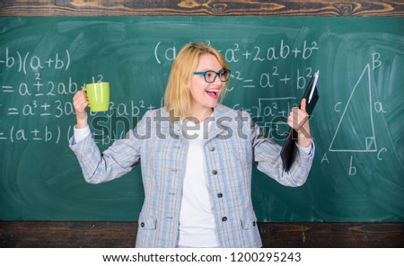Woman with tea cup and document folder chalkboard background. Time to relax. Teacher drink tea or coffee and stay positive. Find time to relax and stay positive. Keep positive attitude to work.