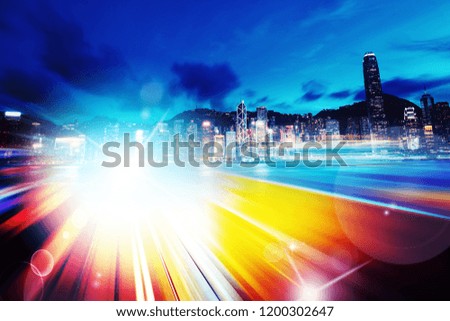 Abstract Light trails background with Hong Kong City scraper. double exposure