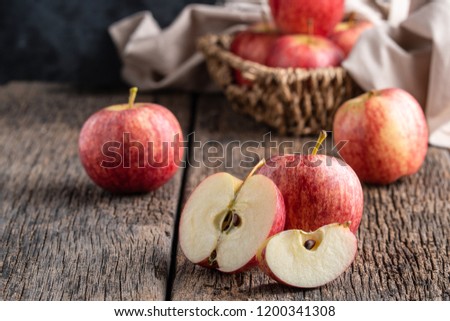 Apples on wooden background.