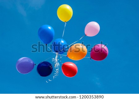 balloons in the air against the sky Royalty-Free Stock Photo #1200353890