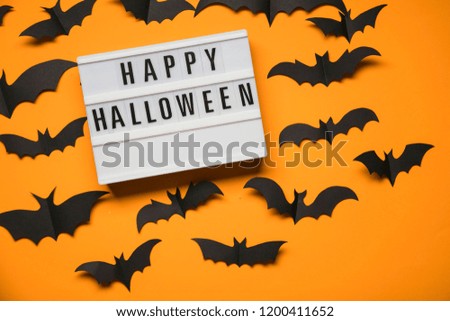 Happy Halloween lightbox message with black scary bats