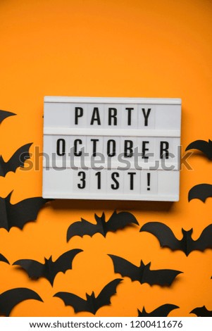 Halloween party lightbox message with black scary bats