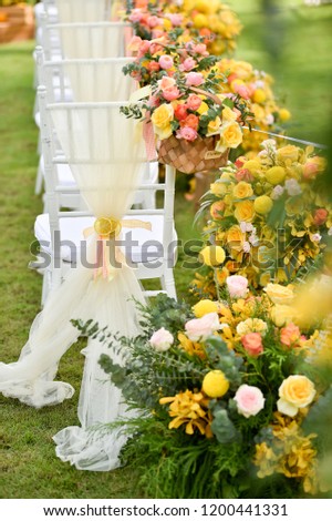 Wedding ceremony flowers setup
