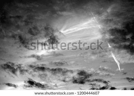 Clouds and sky, may be used as background. Black and white.