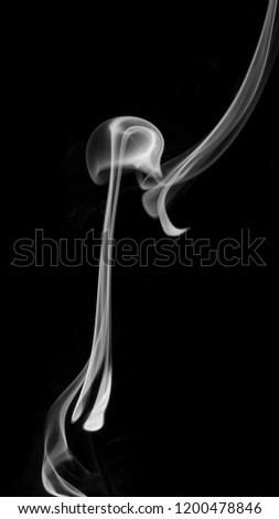 PHOTO of abstract smoke trails, designs, shapes on background. NOT ILLUSTRATIONS