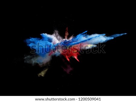 Abstract forms of powder paint and flour combined  together
explode in front of a black background to give off abstract 
multi colored cloud forms.