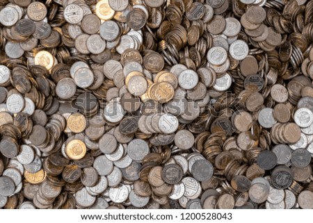 A lot tenge coins background texture. Coins texture background.