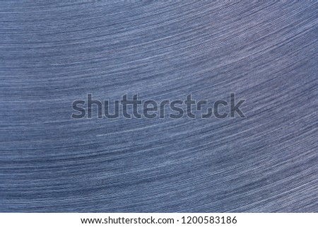Blue metal texture. Scratched curves background.