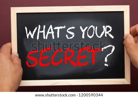 WHAT'S YOUR SECRET? question written on blackboard.