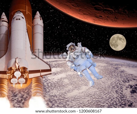 Rocket flies from earth to Mars. Astronaut and moon in the distance. The elements of this image furnished by NASA.
