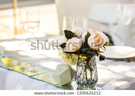 Festive table decor with white flowers