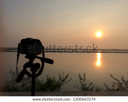 Silhouette Camera for Shooting Landscape Picture, Morning Shot of the Rising Sun.
