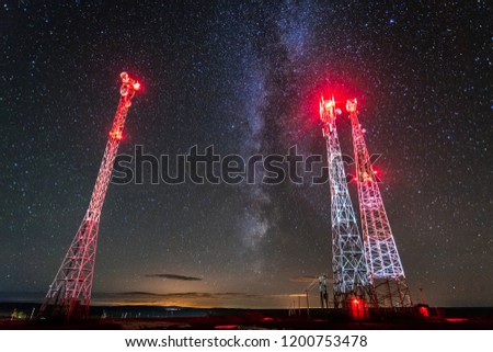 cell towers against the starry sky