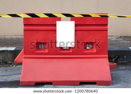 Caution road block orange wall with caution tape and blank sign insert your ad here advertisement warning template