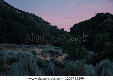Hiking Trail through the Mountains at Sunset