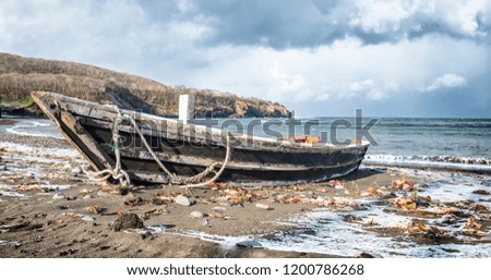 Wooden boat on the sea.
