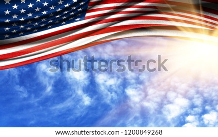 the flag of America in the rays sun