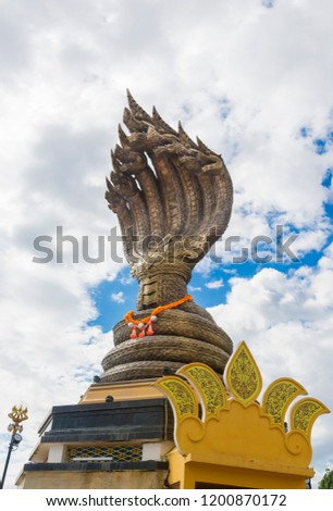 King of Nagas or Serpent statue at public park in Thailand. King of Nagas or Serpent on nature background.