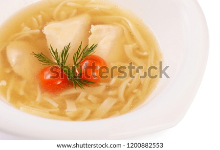 Soup homemade noodles with chicken close up
