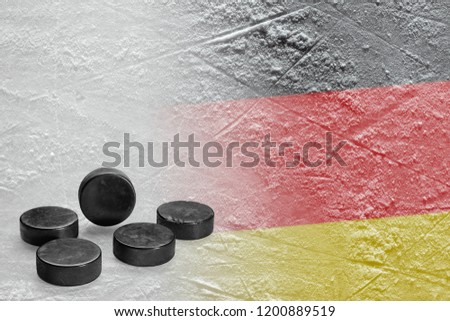 An image of a german flag with hockey pucks. Concept, hockey, background