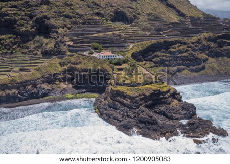 Aerial photograph of house and farming terraces in El Ancon, on the coast of La Orotava in the north of Tenerife, Canary Islands