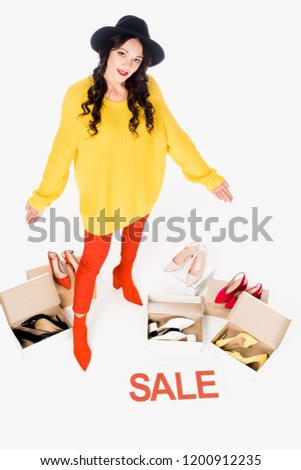 stylish shopaholic with sale symbol isolated on white with shoes 