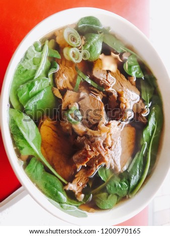 Chinese noodles soup with spinach beef spicy chicken stock spring onion Asian cuisine traditional food