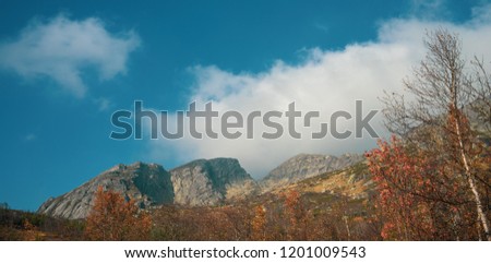 Mountain peaks in Sirdal, Norway. The picture is taken in nice autumn sun.