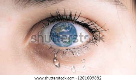 Close up image of human eye with earth in it. Macro Eye w/ Earth as Iris Composite
