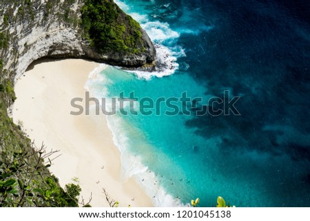 Stunning view on coastline of Manta Bay or Kelingking Beach at Nusa Penida Island, Bali, Indonesia. Concept of travel to ever summer beach destinations. 
