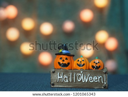 Jack O Lantern Halloween Pumpkin with bokeh effect background, Halloween holiday celebration, Use for desktop wallpaper or website design, template with copy space for text.