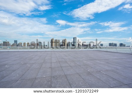 empty square with city skyline  in wuhan china