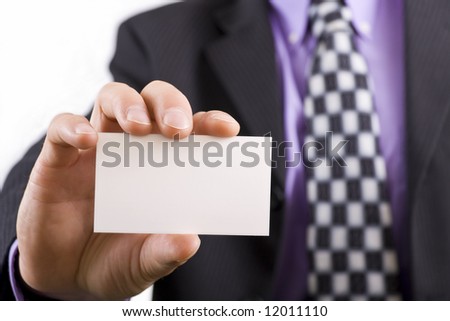 Blank business card in a mans hand