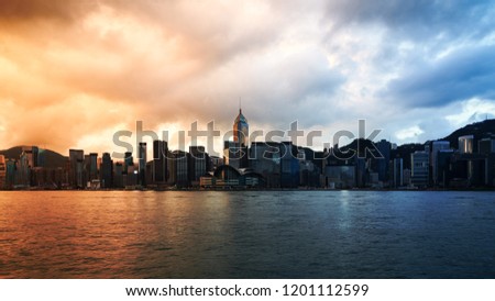 surreal sunrise skyline with cityscape building along harbour in cool and hot concept