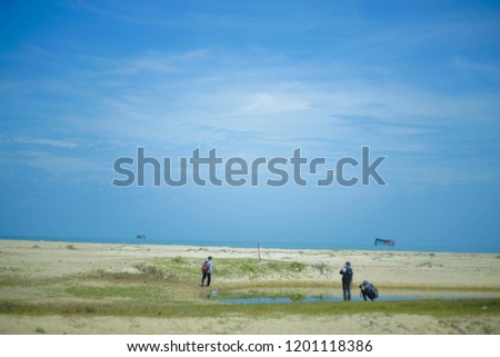 People take pictures of beautiful beaches, clear sky