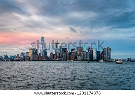 Skyline and waterfront of Downtown of New York City at sunset